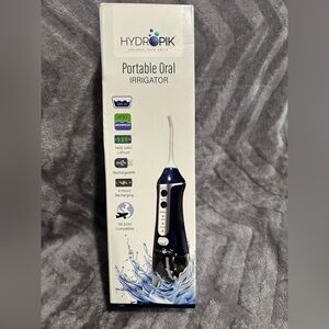 Hydropik portable oral irrigation‎ tool